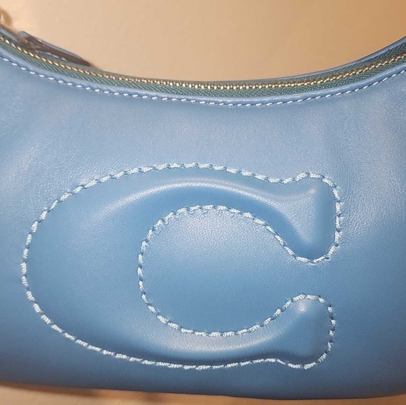 Coach NWT silver, bright blue, soft cloud feel, metallic + guitar strap - Picture 4 of 14